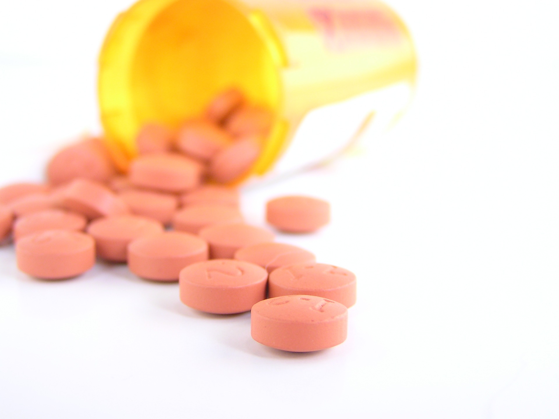 pink pills spilling out